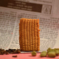 Traditional style India biscuit made with whole wheat flour, Atta biscuit online with newspaper as background professional product photography